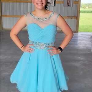 Elegant Blue Sleeveless Dress with Beaded Details